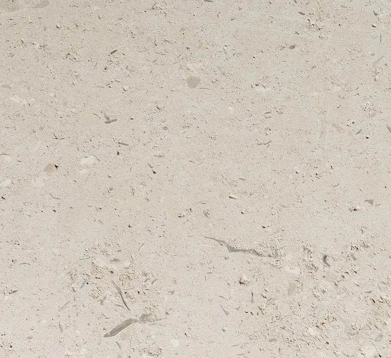 Close-up sample of Portland Whitbed stone with a light, finely textured surface.